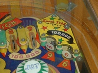 Image # 23504: 4 Star Playfield - Detail 
(The pop bumper cap in this image is not original to this game.)