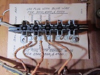 Image # 52518: Friendship "7" Extra Ball Score Adjustment 
(The plugs were removed from the jacks for this photo to allow a better view of the text.)
