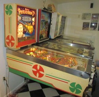Image # 52508: Friendship "7" Cabinet - Left 
(The game shown here has a reproduction backglass but is included to show its other features.)