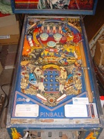 Image # 32027: Frontier Playfield 
(A white stcker has been added after-factory to the center stand-up target. The yellow standup target is not original to this game.)