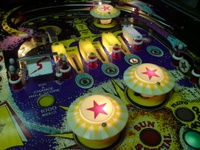 Image # 35978: Galaxy Upper Right Playfield 
(The design on the spinning target does not match the one shown on the manufacturer flyer.)